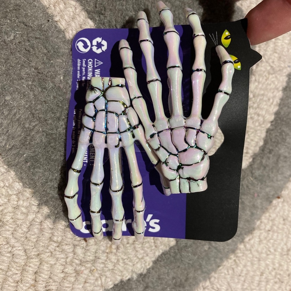 Claire’s iridescent skeleton hair clips